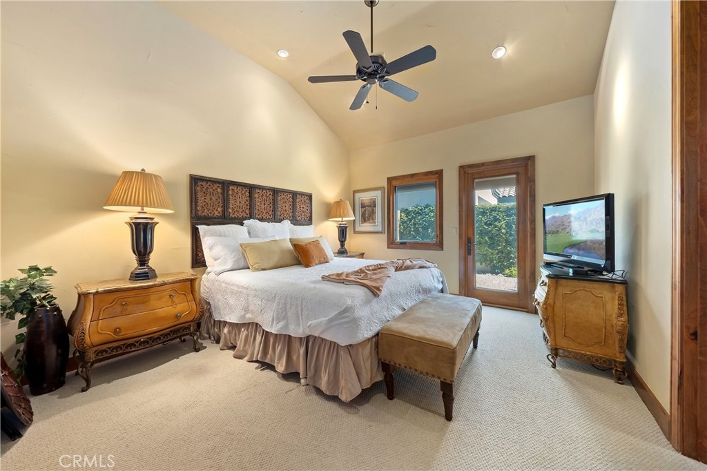57205 Merion La Quinta, CA 92253 - Photo 28 of 53 Hallway to bedroom 3 + ensuite, laundry area and garage.