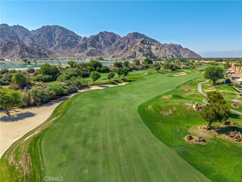 57205 Merion La Quinta, CA 92253 - Photo 50 of 55 a view of a lush green hillside and houses