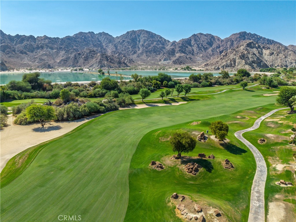 57205 Merion La Quinta, CA 92253 - Photo 52 of 55 an aerial view of a golf course with parking space