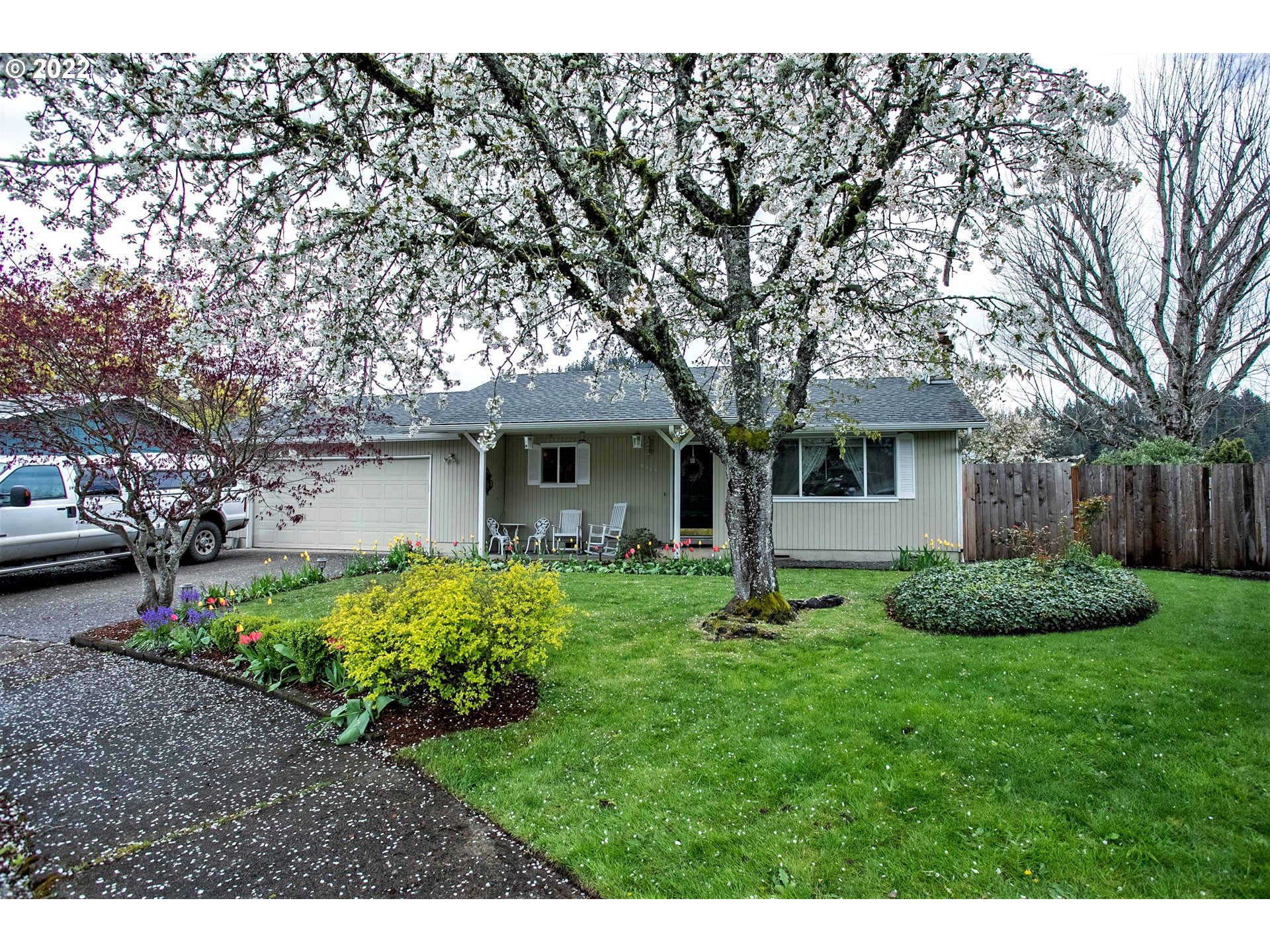 6305 C Street Springfield, OR 97478 - Photo 1 of 32 a view of a house with backyard and garden
