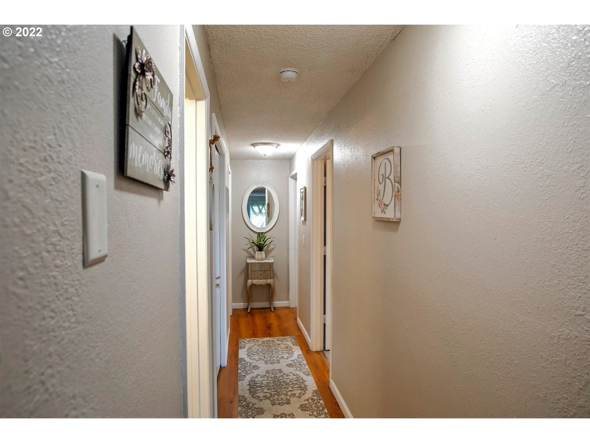 6305 C Street Springfield, OR 97478 - Photo 16 of 32 a view of a hallway with a elevator