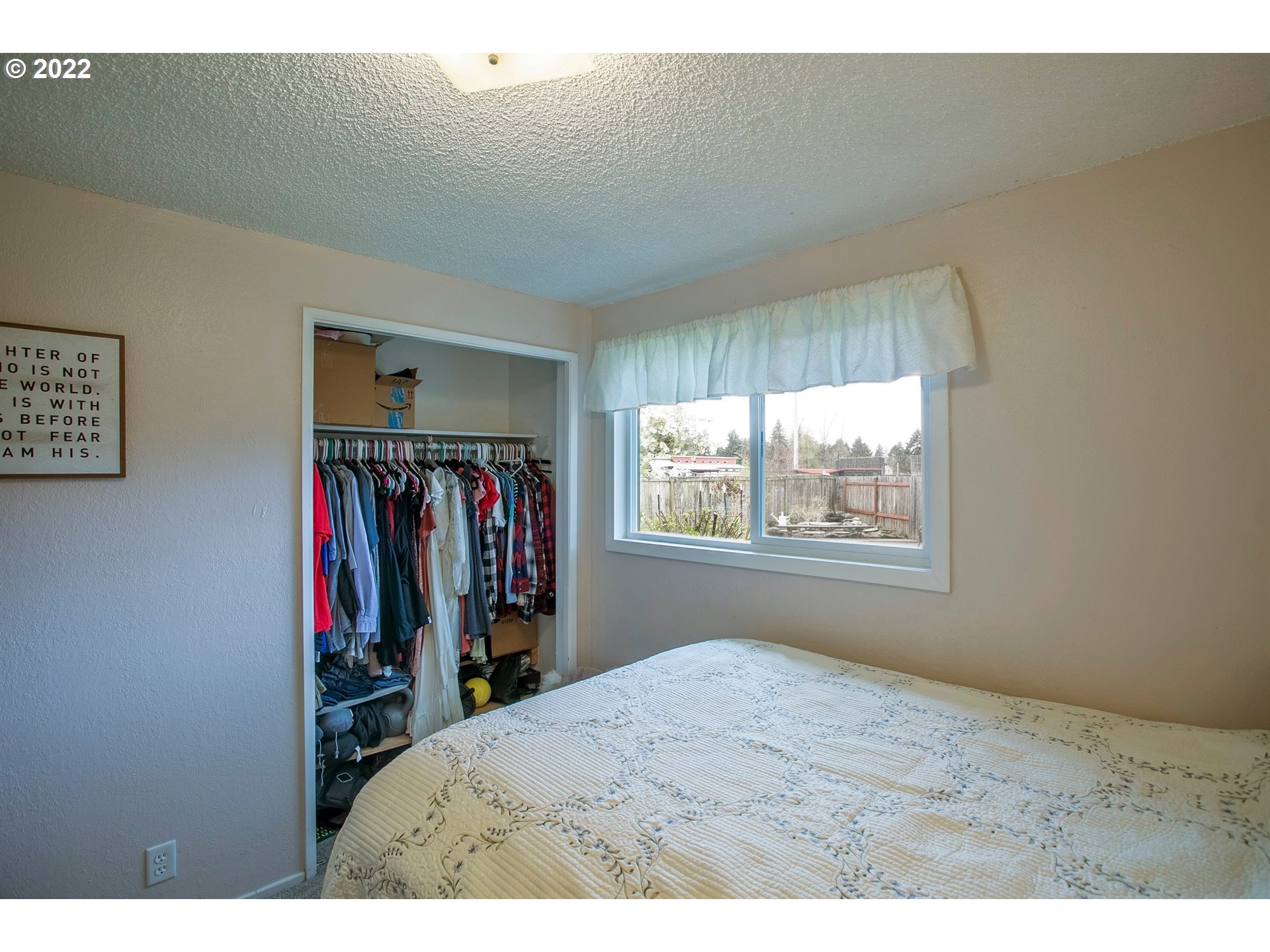 6305 C Street Springfield, OR 97478 - Photo 19 of 32 a view of a bedroom with wooden floor and window