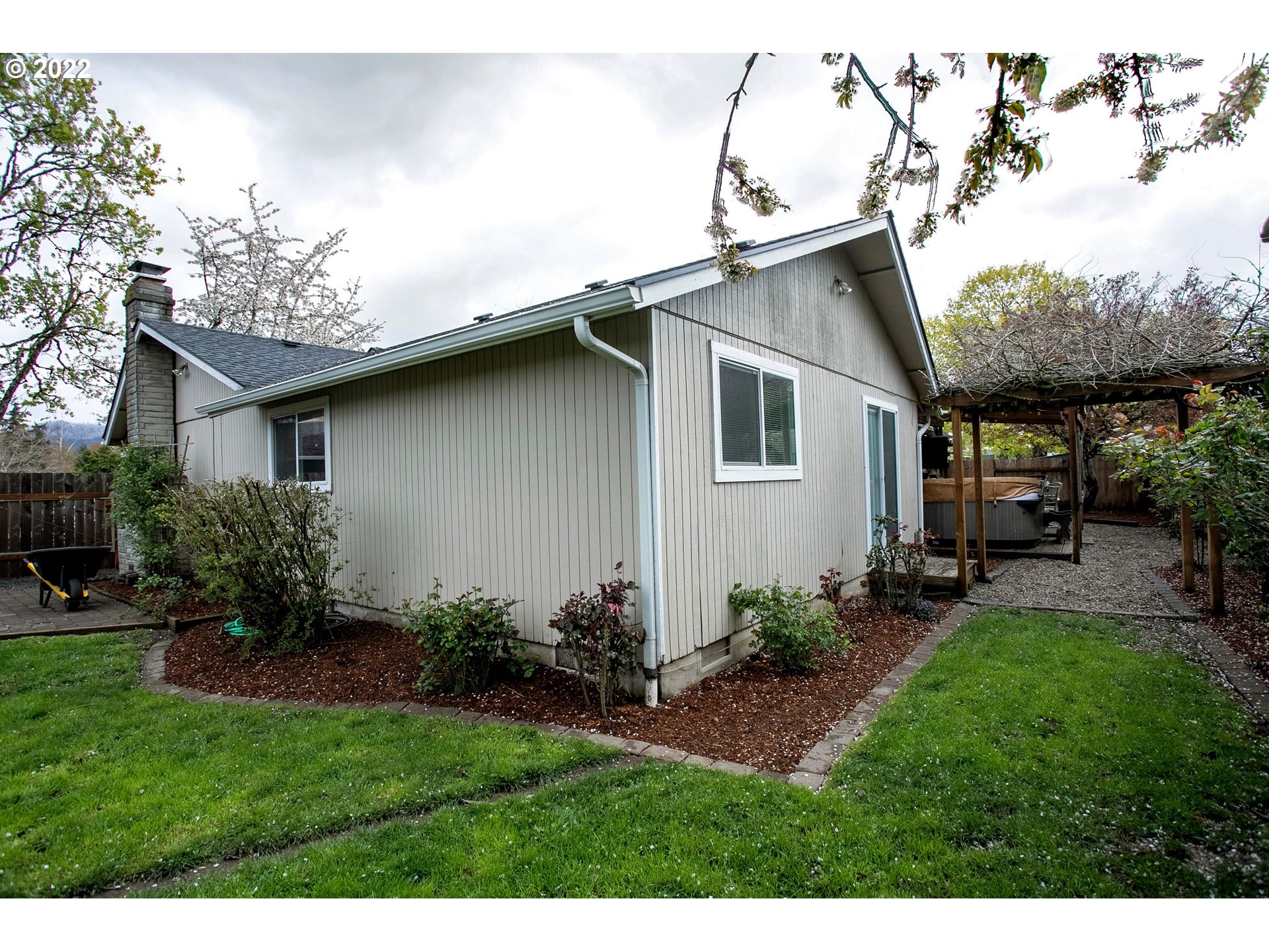 6305 C Street Springfield, OR 97478 - Photo 28 of 32 a house view with a garden space