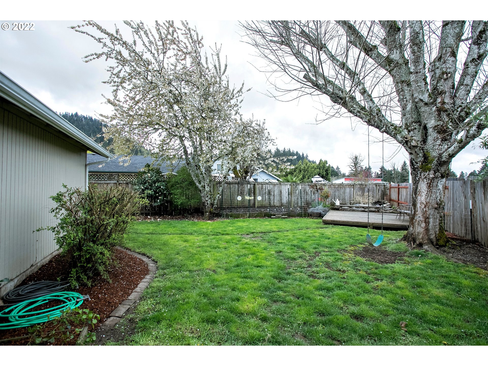 6305 C Street Springfield, OR 97478 - Photo 31 of 32 a house view with a garden space