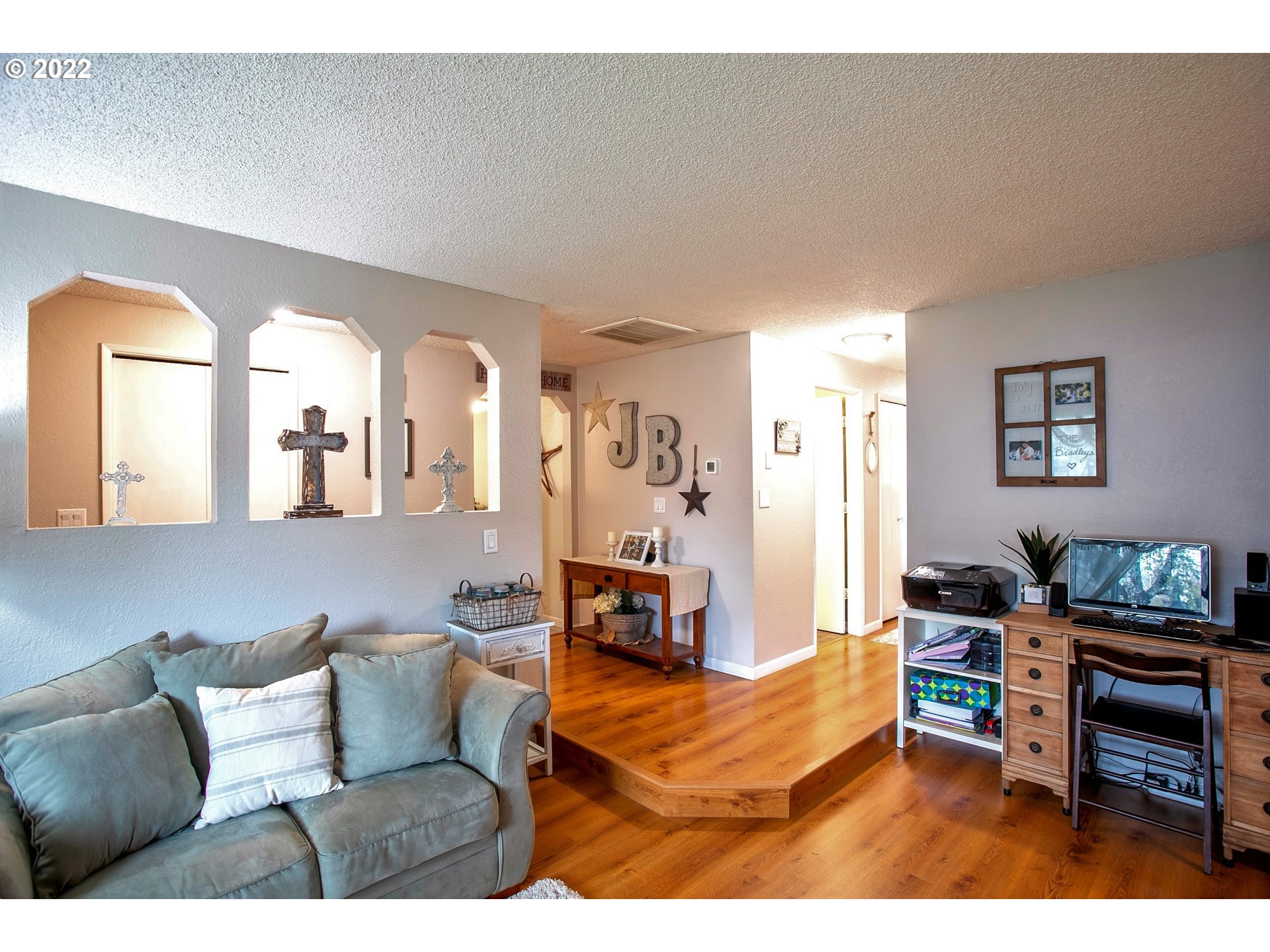 6305 C Street Springfield, OR 97478 - Photo 6 of 32 a living room with furniture and a wooden floor