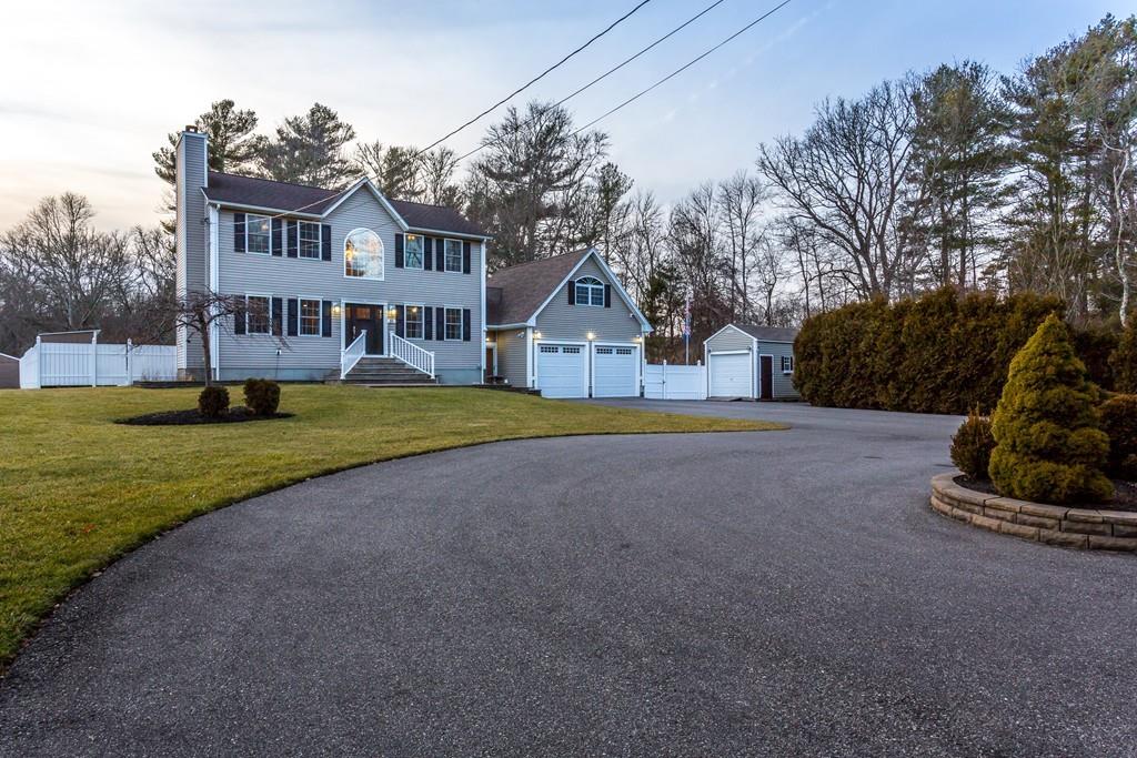 85 Gammons Road Acushnet, MA 02743 - Photo 7 of 35 a view of a house with a big yard and large trees