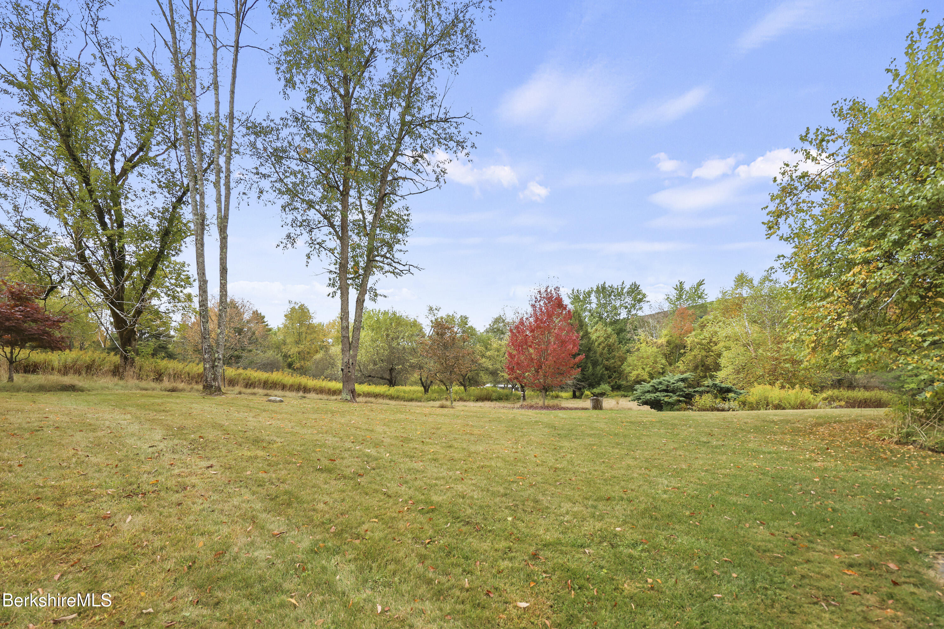1030 Simonds Road Williamstown, MA 01267 - Photo 70 of 76 a view of a field with trees in the background