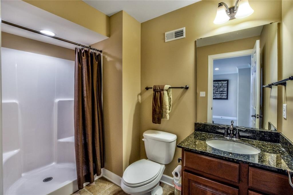 2003 Eagle Ridge Drive Valencia, PA 16059 - Photo 22 of 25 Lower Level Full Bath w/Granite Countertop, Walk-In Shower, Ceramic Tile Floor