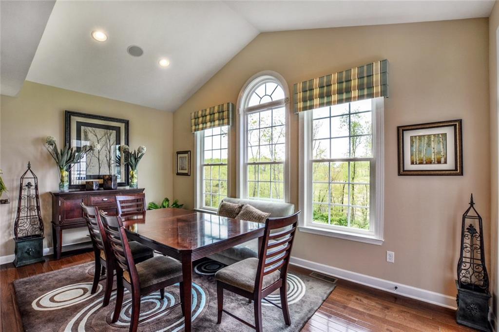 Morning room w/Hardwood Floors, Recessed Lighting, Speakers, Vaulted Ceiling & Access to Deck