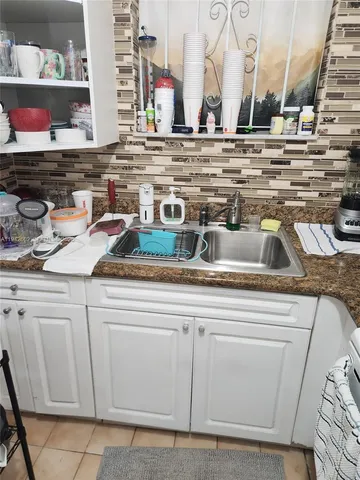 a view of the kitchen sink