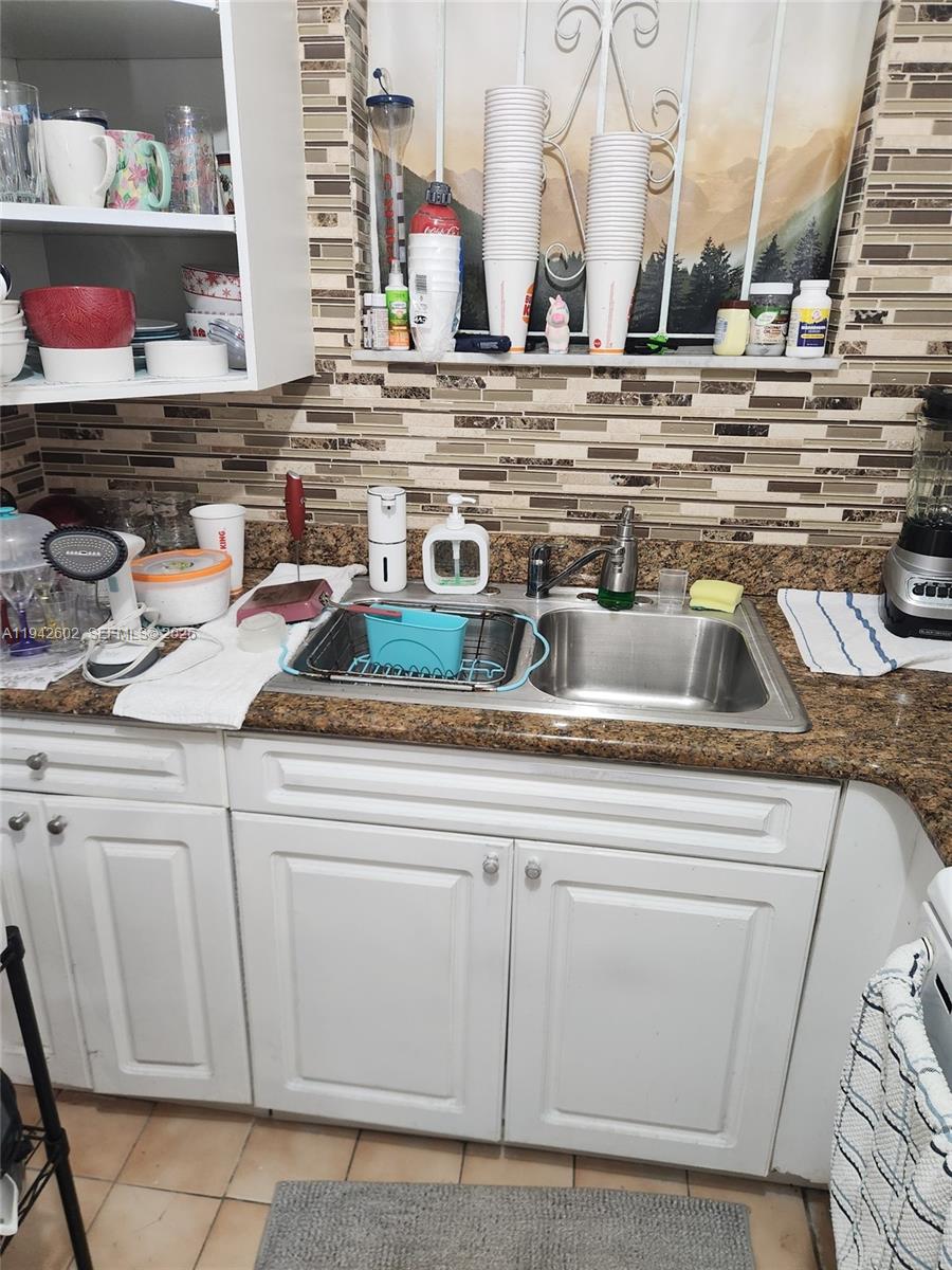 2498 Southwest 17th Avenue, Unit 4209 Miami, FL 33133 - Photo 5 of 7 a view of the kitchen sink