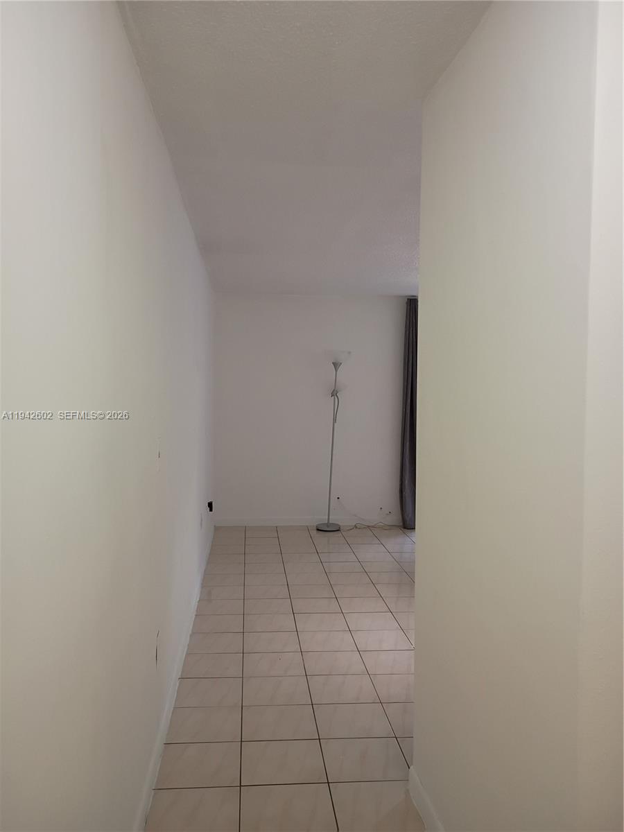 2498 Southwest 17th Avenue, Unit 4209 Miami, FL 33133 - Photo 8 of 15 a view of an empty room