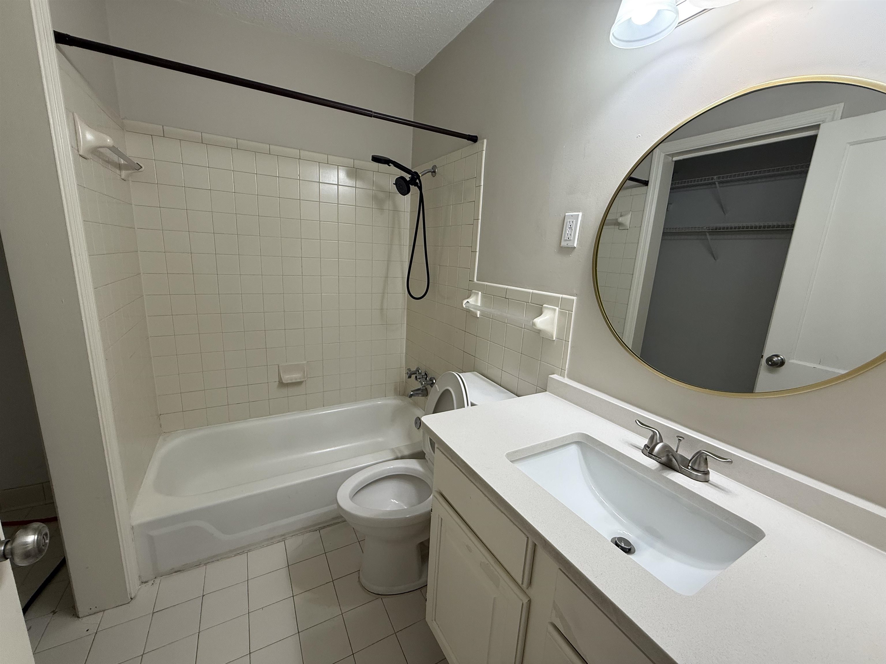 1409 Dearing Road Memphis, TN 38117 - Photo 8 of 9 a bathroom with a sink toilet and shower