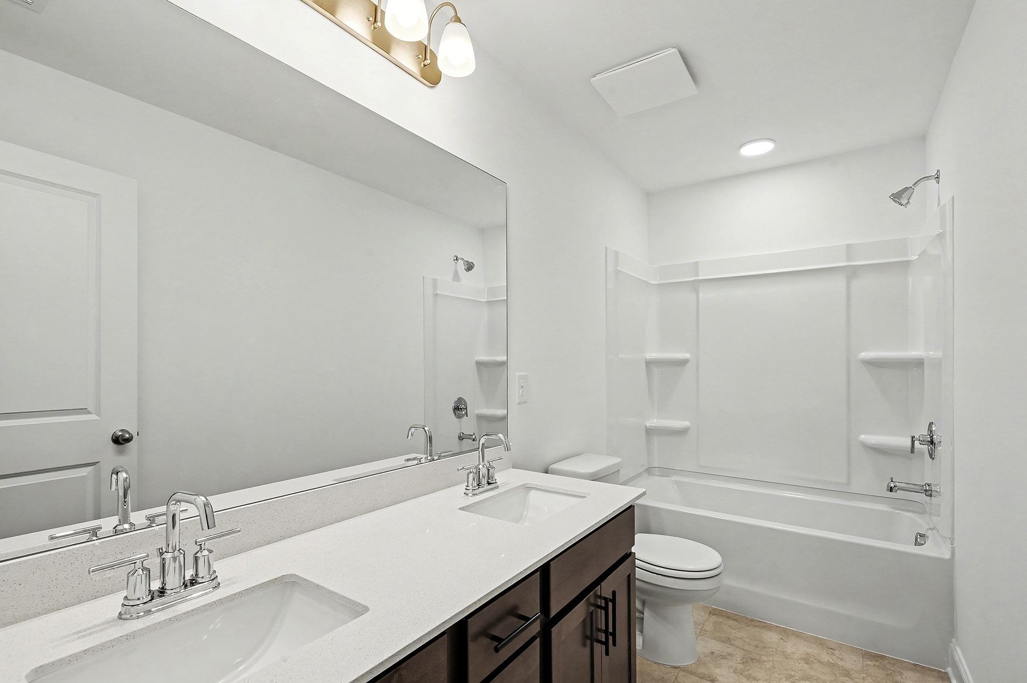 1029 Riverview Run Madison, TN 37115 - Photo 15 of 29 a bathroom with a sink a toilet a tub and shower