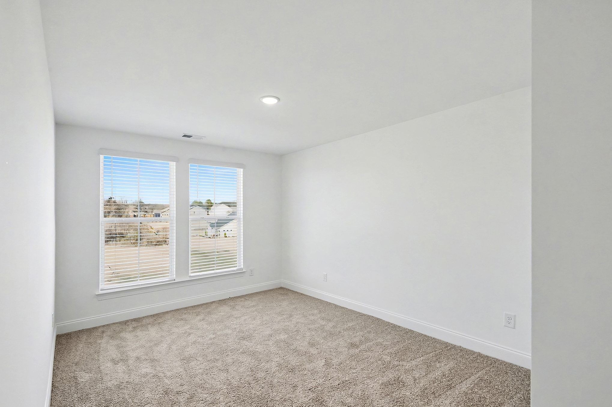 1029 Riverview Run Madison, TN 37115 - Photo 17 of 29 an empty room with windows