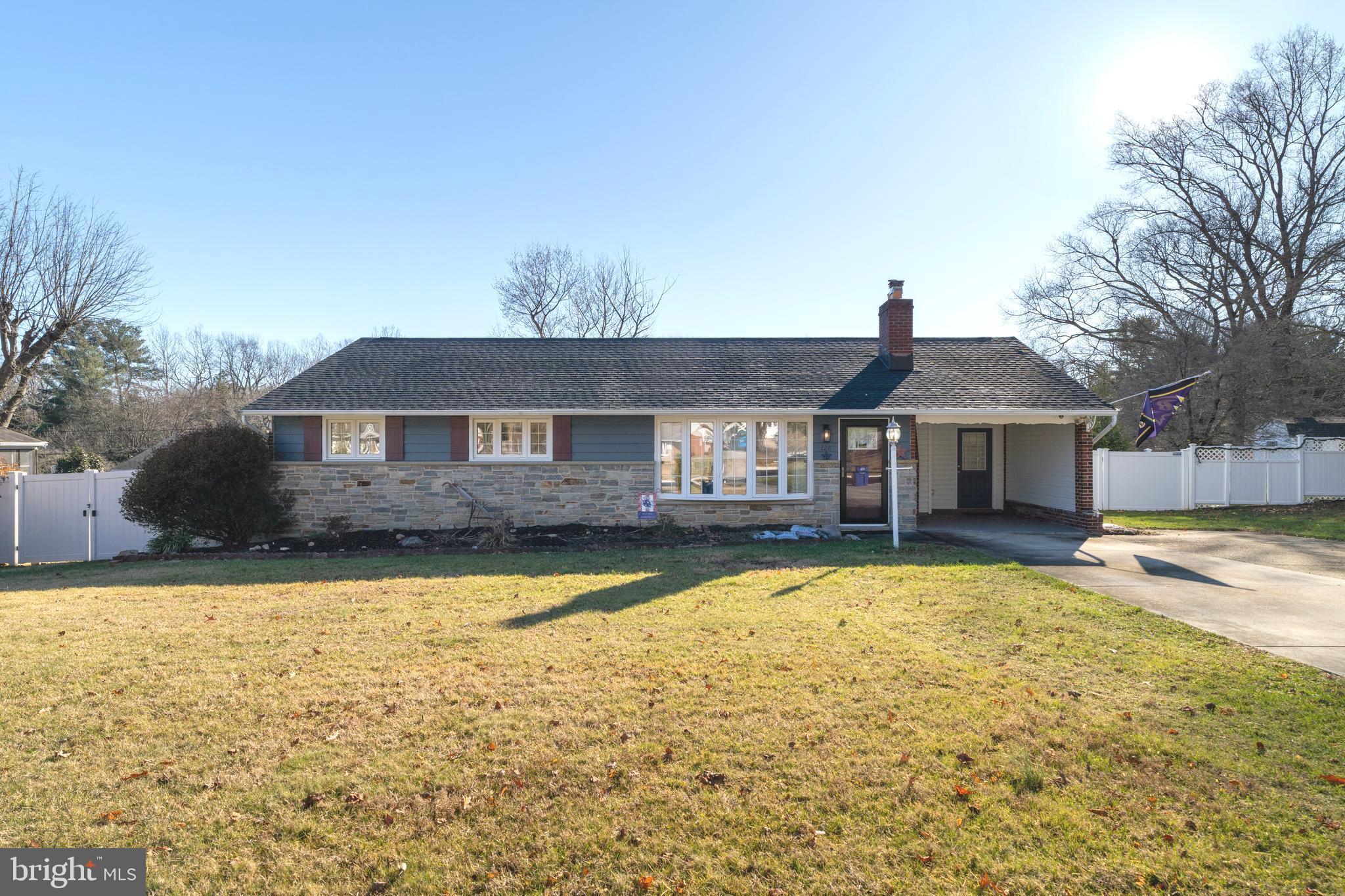 a front view of a house with swimming pool