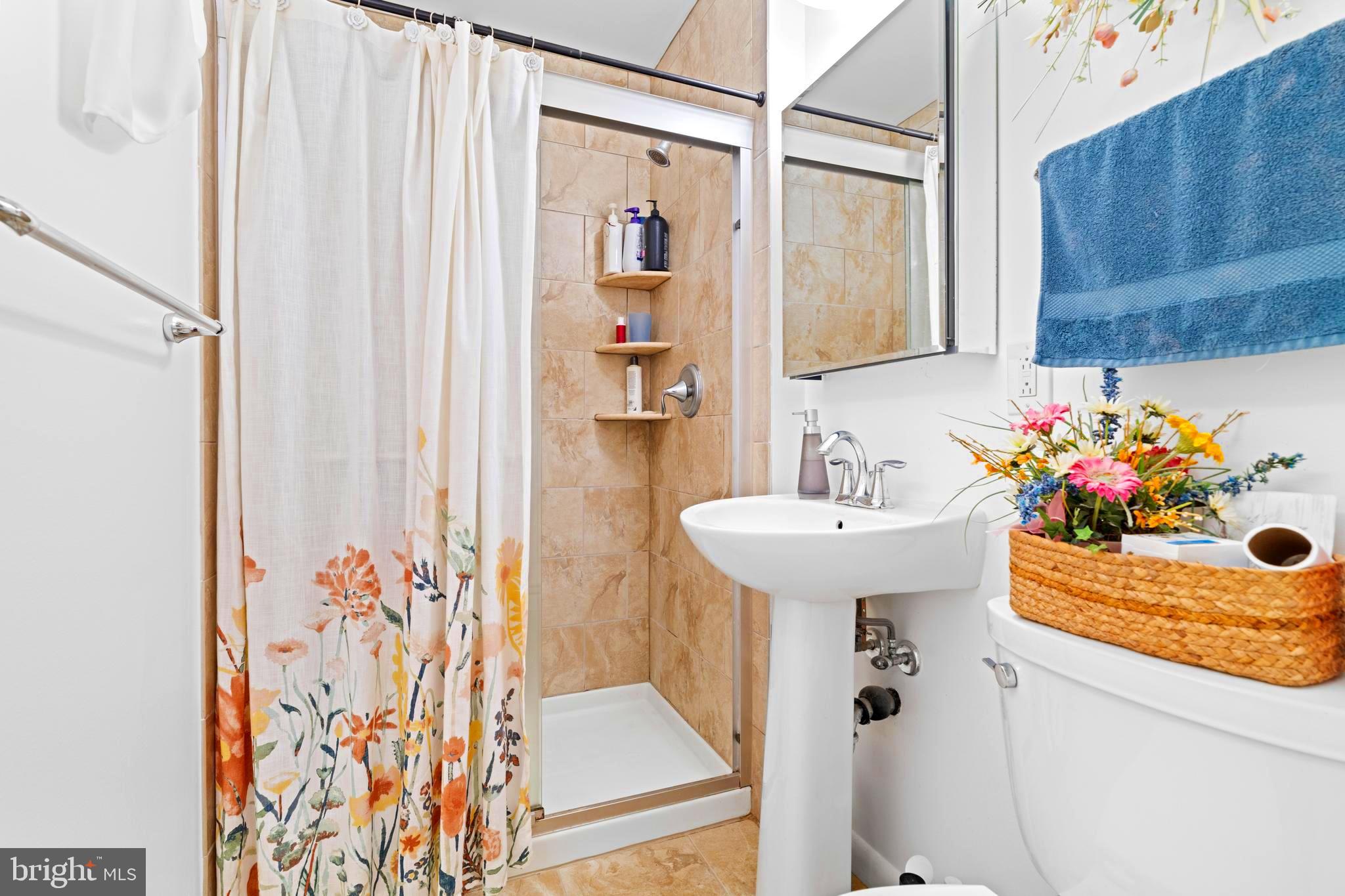 128 North Lynbrook Road Bel Air, MD 21014 - Photo 21 of 48 a bathroom with a sink and a mirror