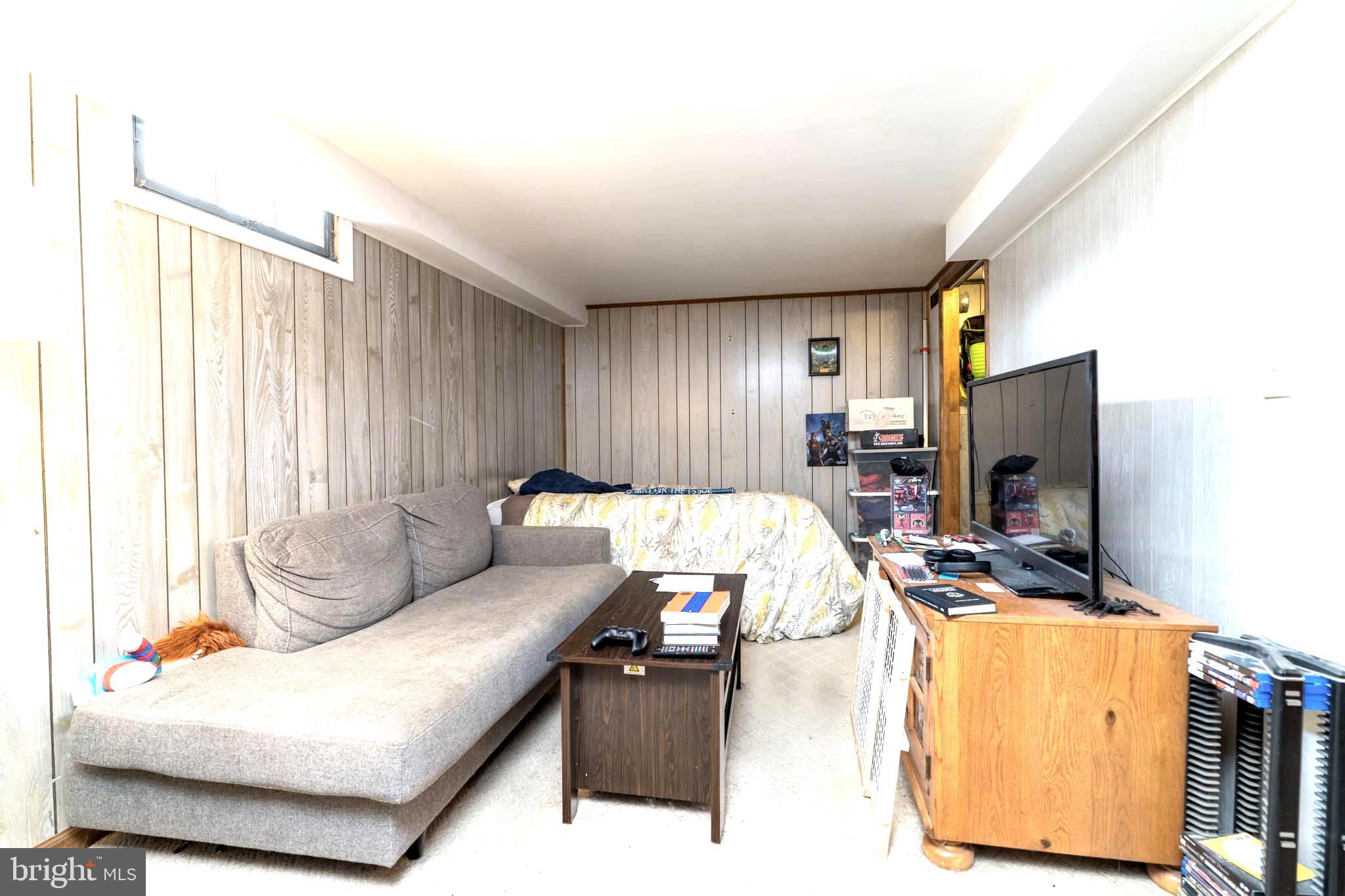 128 North Lynbrook Road Bel Air, MD 21014 - Photo 22 of 48 a living room with furniture and a flat screen tv