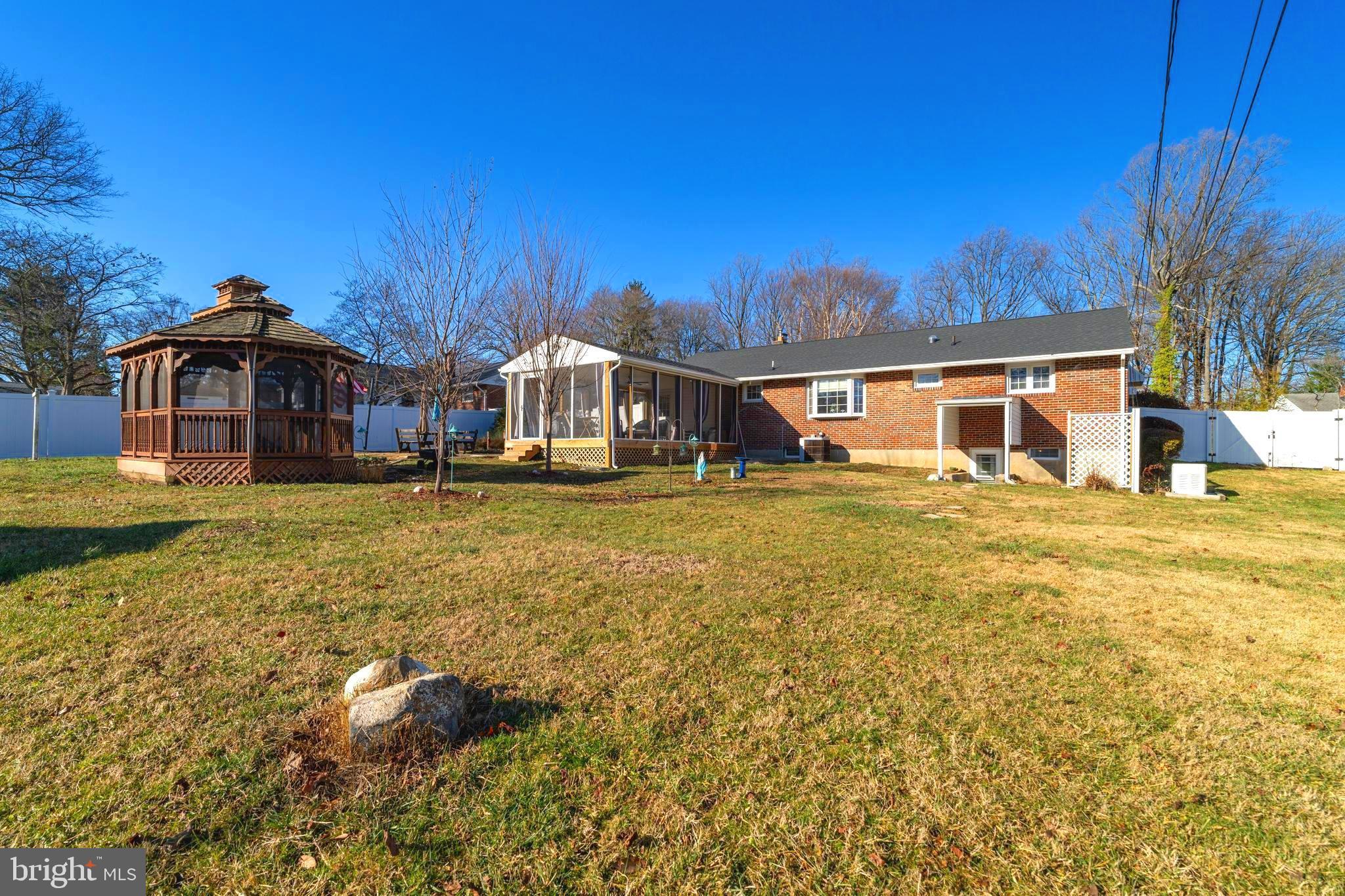 128 North Lynbrook Road Bel Air, MD 21014 - Photo 25 of 48 a view of a house with a big yard
