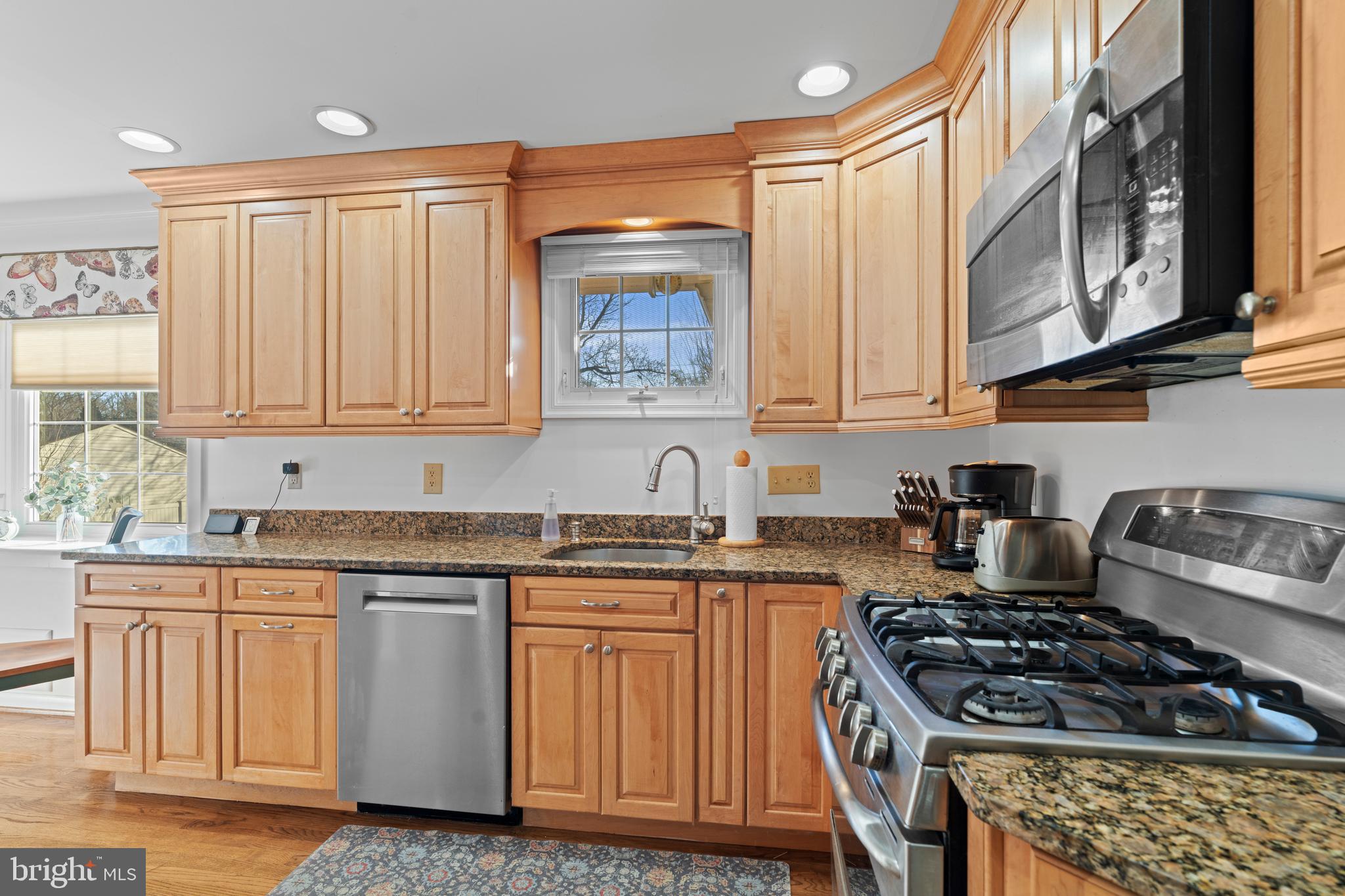 128 North Lynbrook Road Bel Air, MD 21014 - Photo 29 of 48 a kitchen with stainless steel appliances granite countertop a stove and a sink