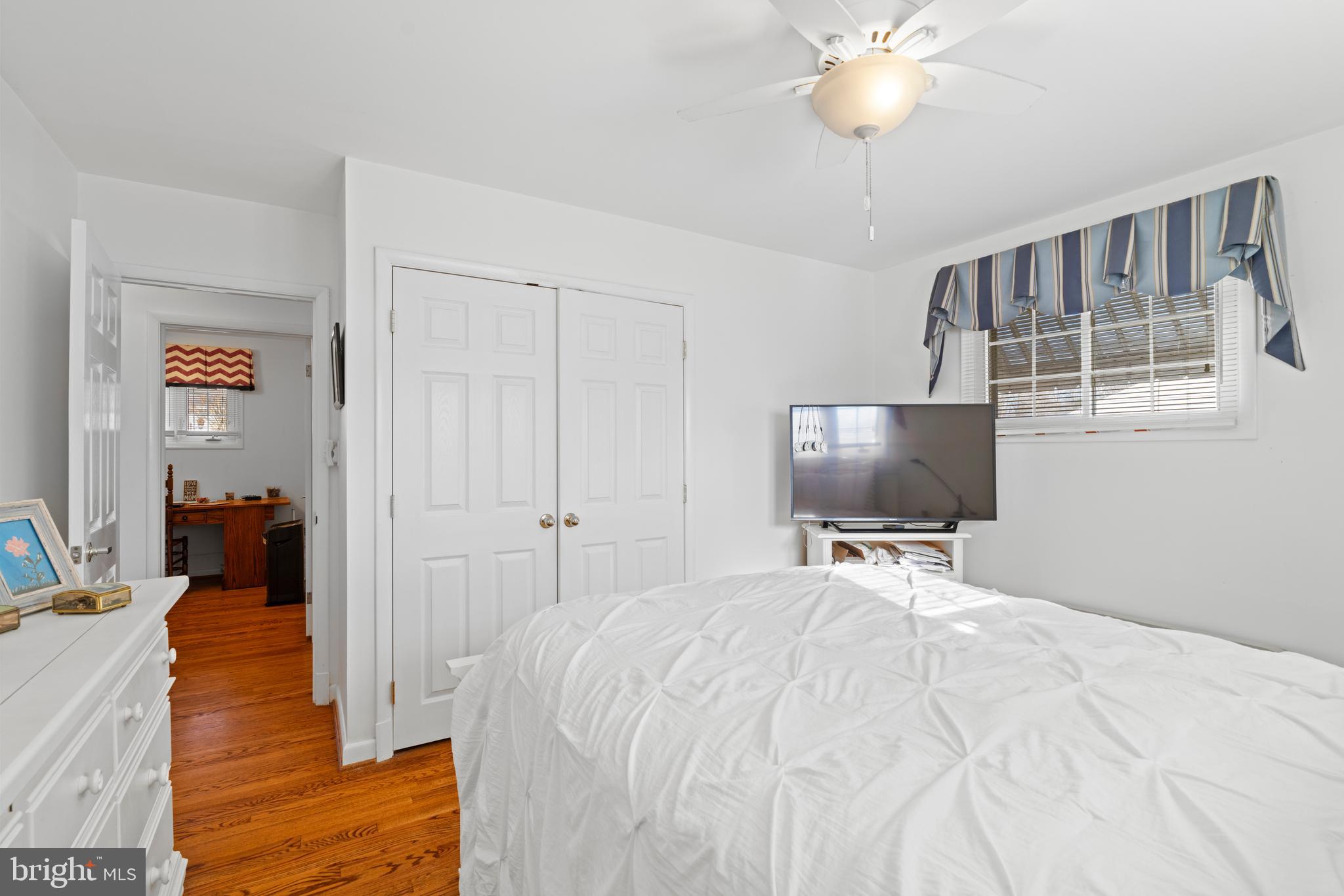 128 North Lynbrook Road Bel Air, MD 21014 - Photo 31 of 48 a bedroom with a bed and a flat tv screen on dresser