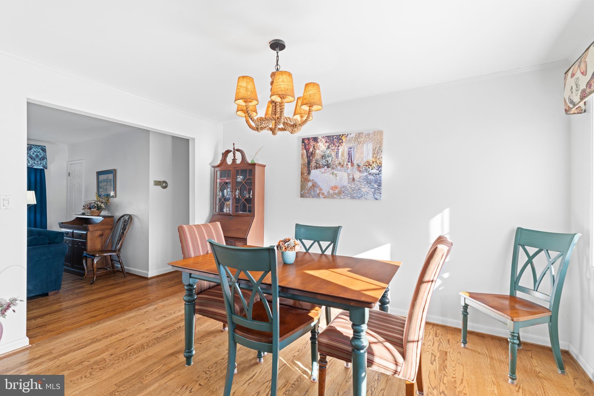 128 North Lynbrook Road Bel Air, MD 21014 - Photo 39 of 48 a view of a dining room with furniture and wooden floor