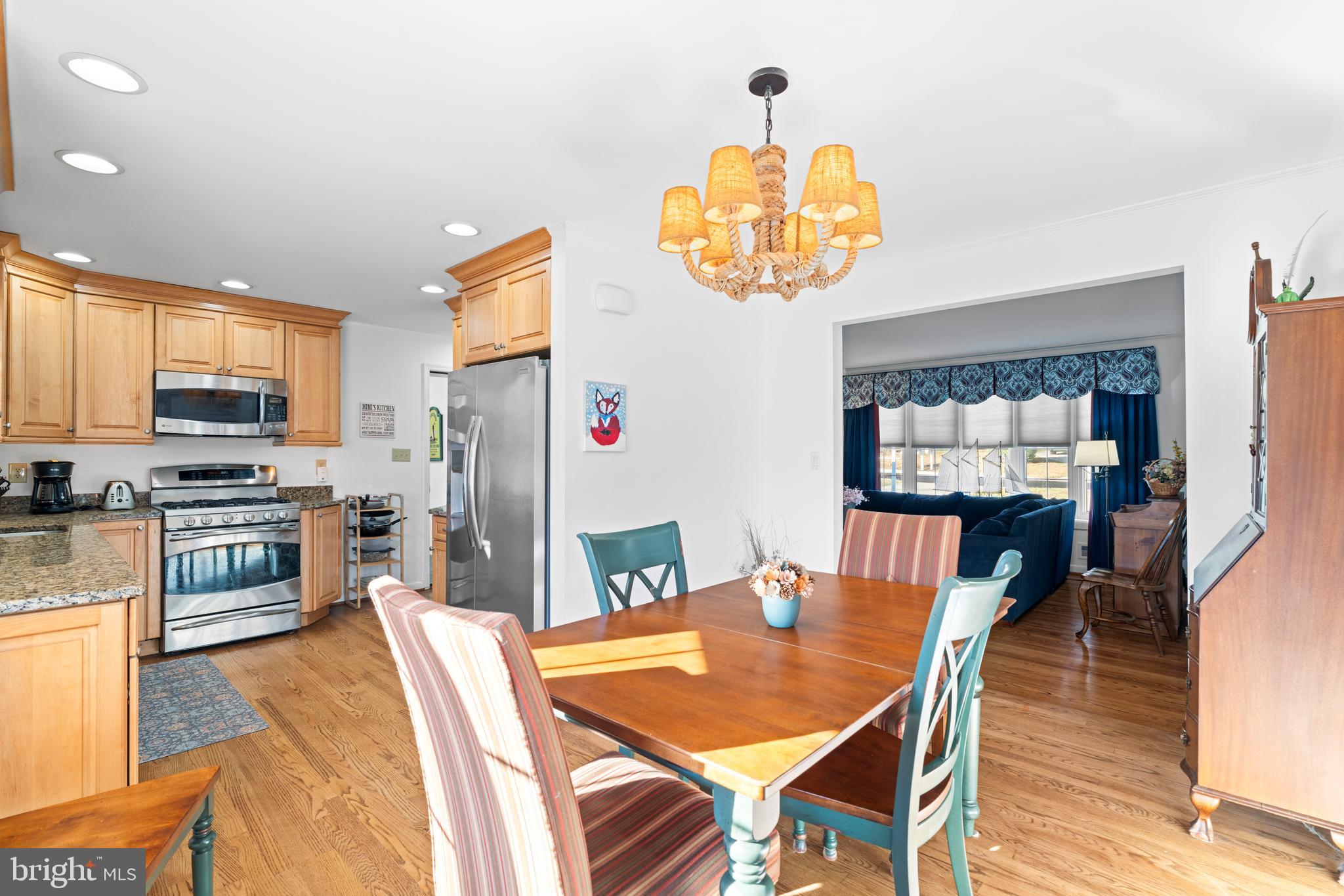 128 North Lynbrook Road Bel Air, MD 21014 - Photo 40 of 48 a view of a dining room with furniture wooden floor and chandelier