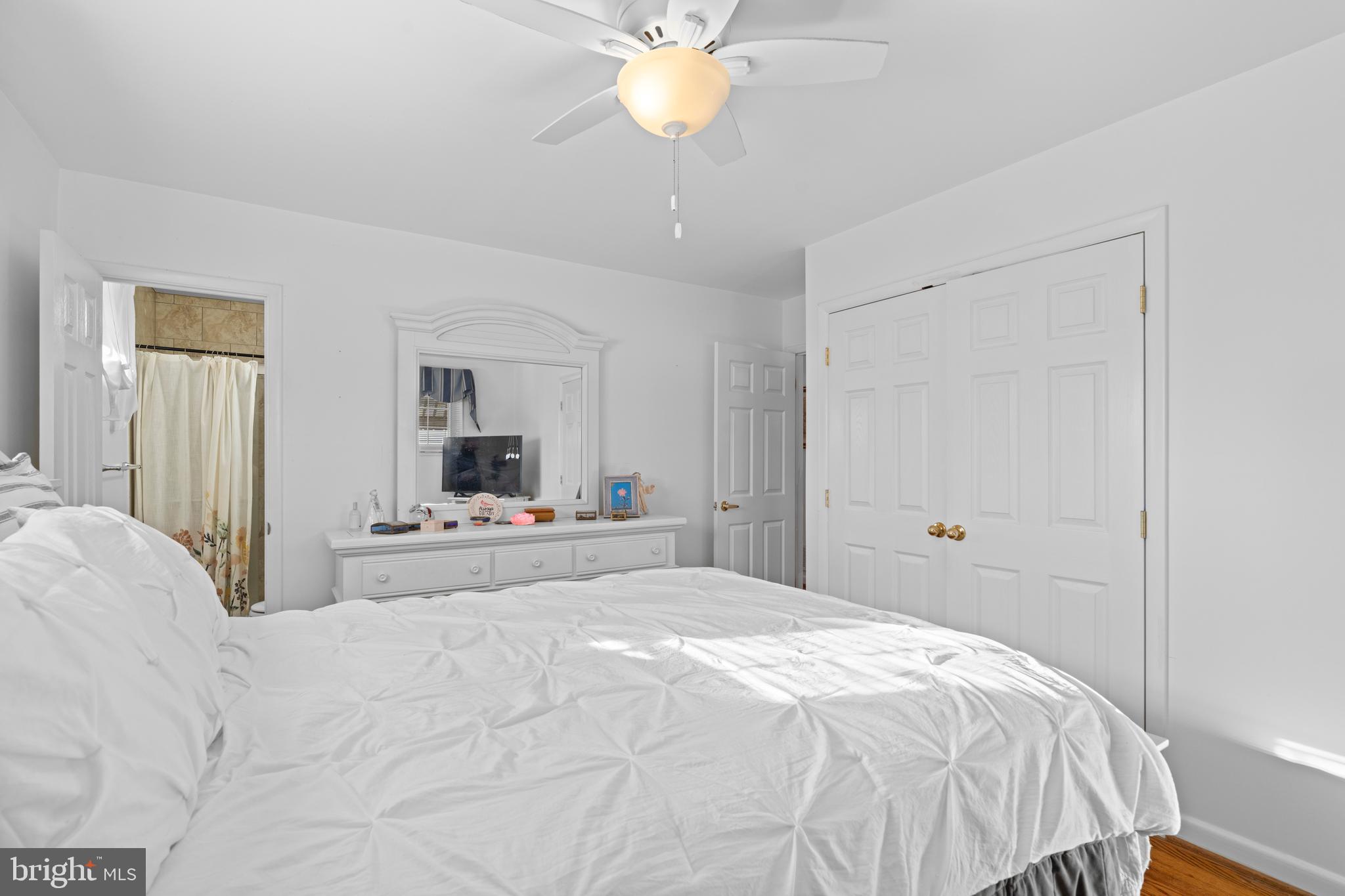 128 North Lynbrook Road Bel Air, MD 21014 - Photo 42 of 48 a bedroom with a bed and a chandelier