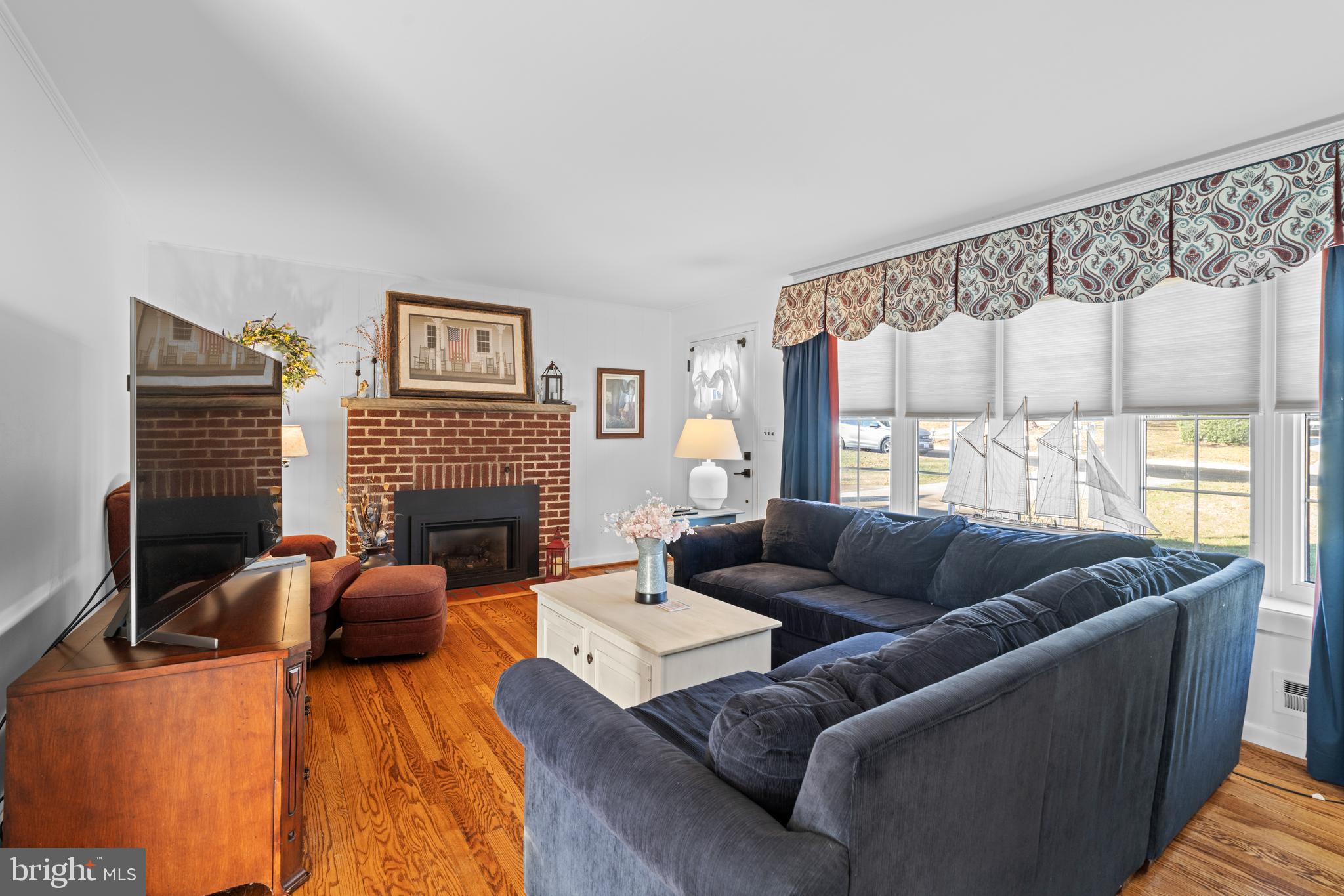 128 North Lynbrook Road Bel Air, MD 21014 - Photo 6 of 48 a living room with furniture fireplace and a large window