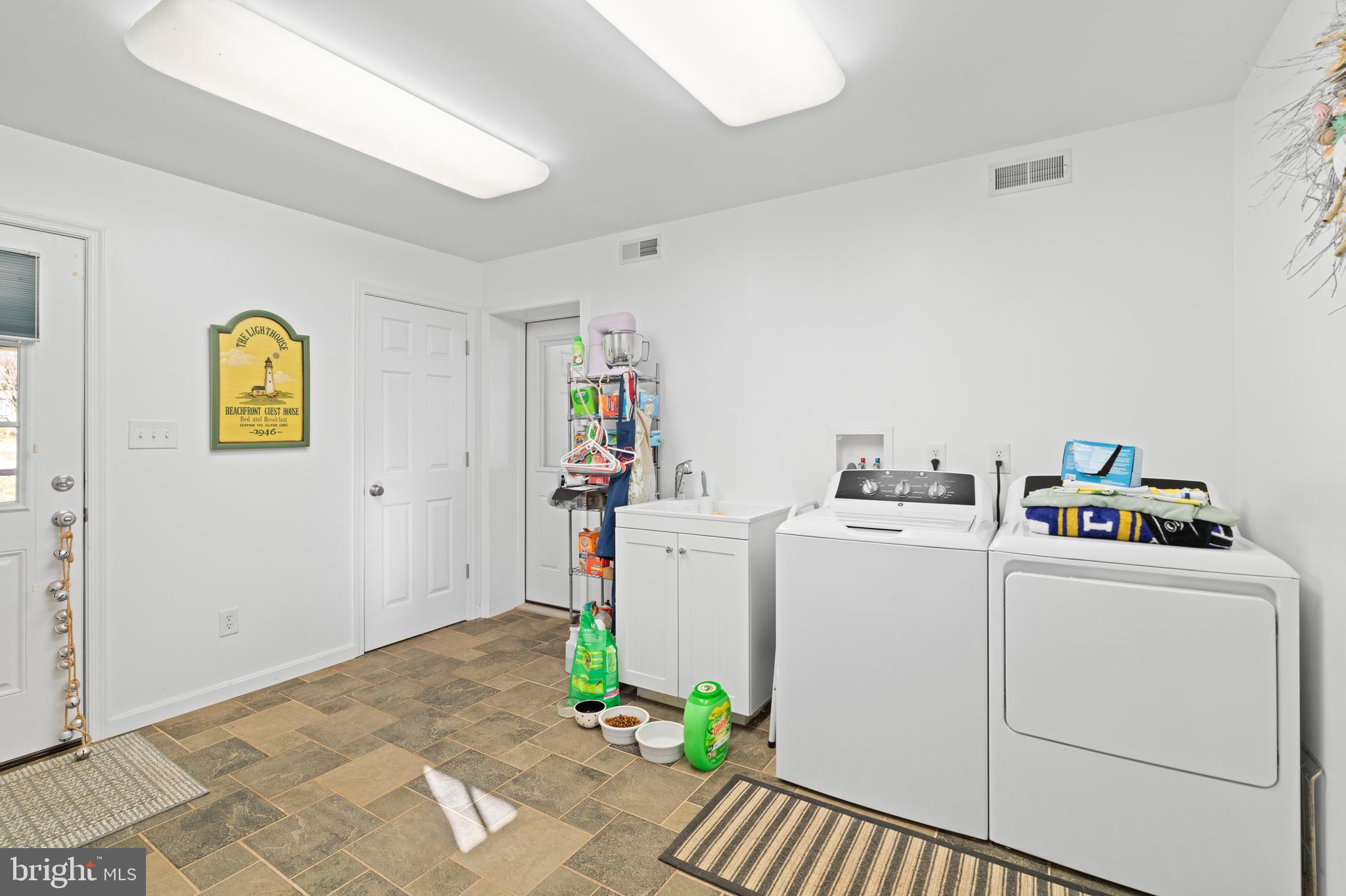 128 North Lynbrook Road Bel Air, MD 21014 - Photo 8 of 48 a utility room with dryer and washer