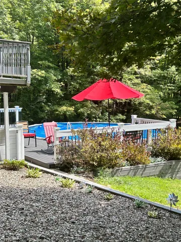 a view of a livingroom with furniture and entryway