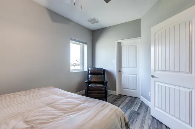 a view of a dining table and chairs
