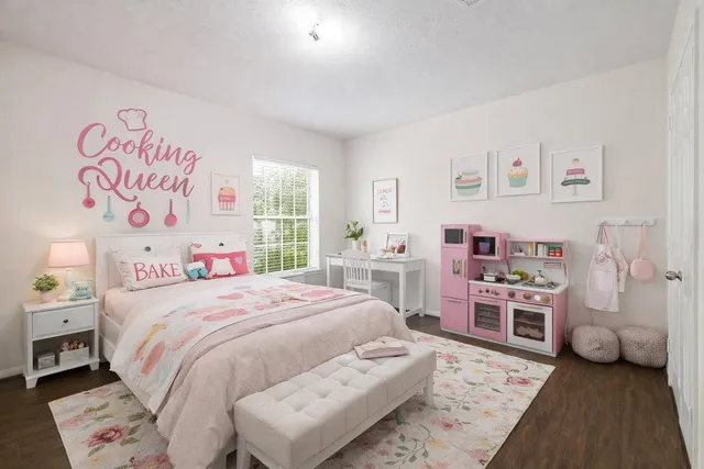 a bedroom with a bed and a cabinets