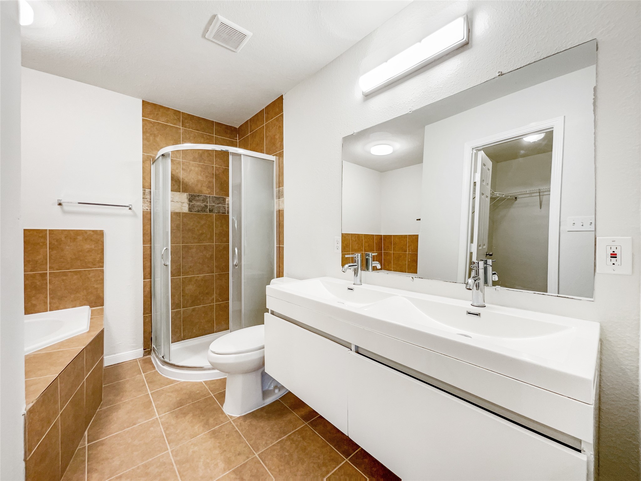 3407 Peachstone Place Spring, TX 77389 - Photo 5 of 17 a bathroom with a sink toilet and shower