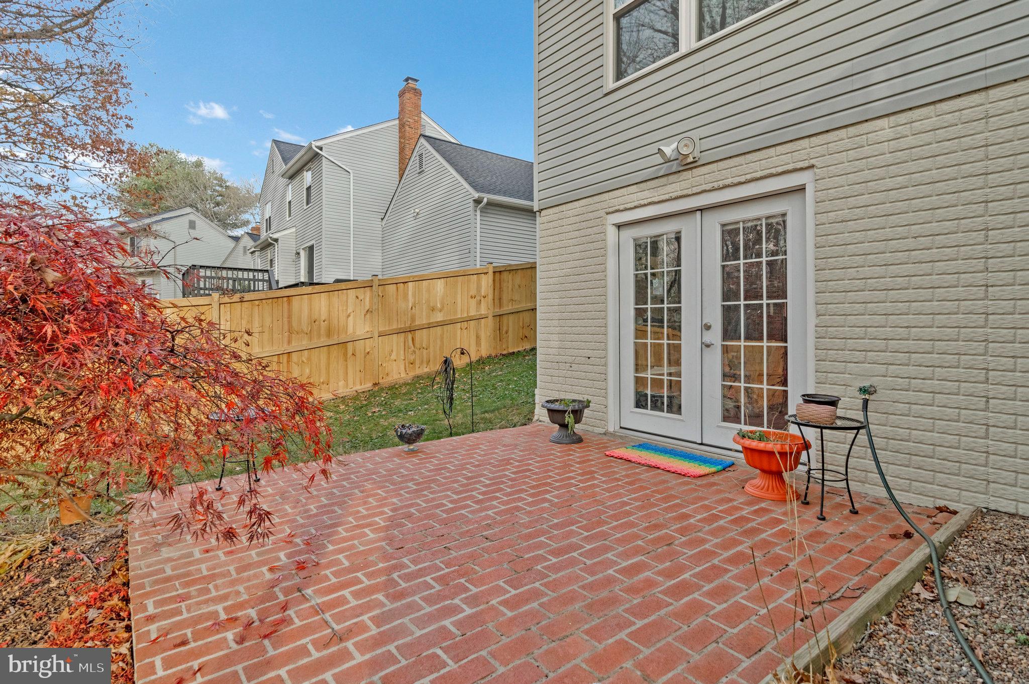 814 Potomac Ridge Court Sterling, VA 20164 - Photo 12 of 14 Pretty patio. Roof 2024. Hot Water Heater 2023.