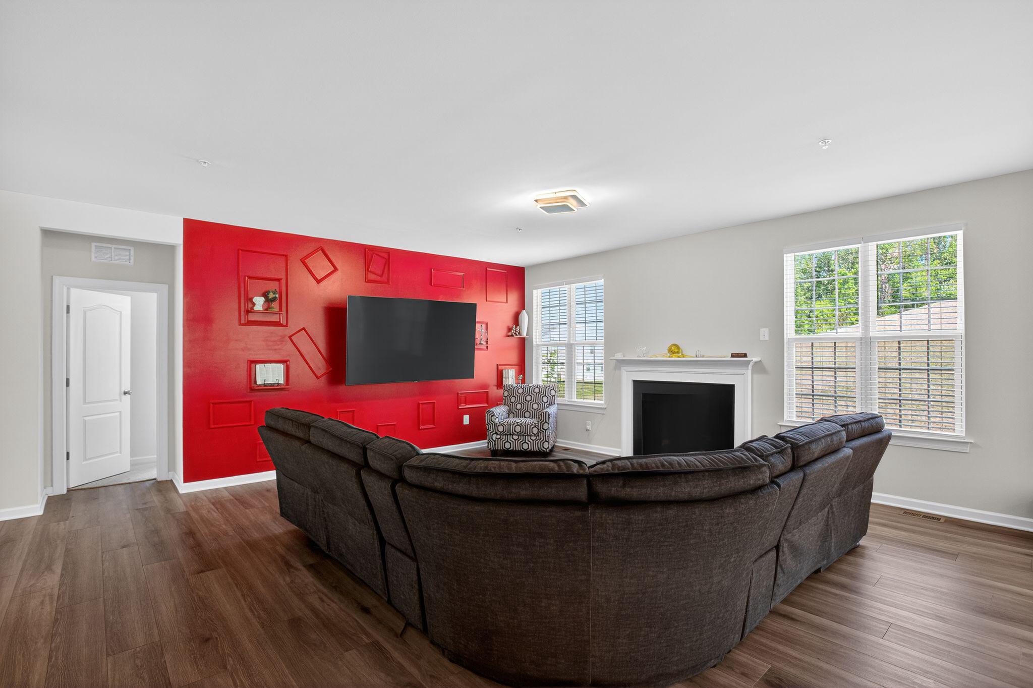 5500 Big Huntingdon Lane Brandywine, MD 20613 - Photo 7 of 31 Family room with bold accent wall & gas fireplace