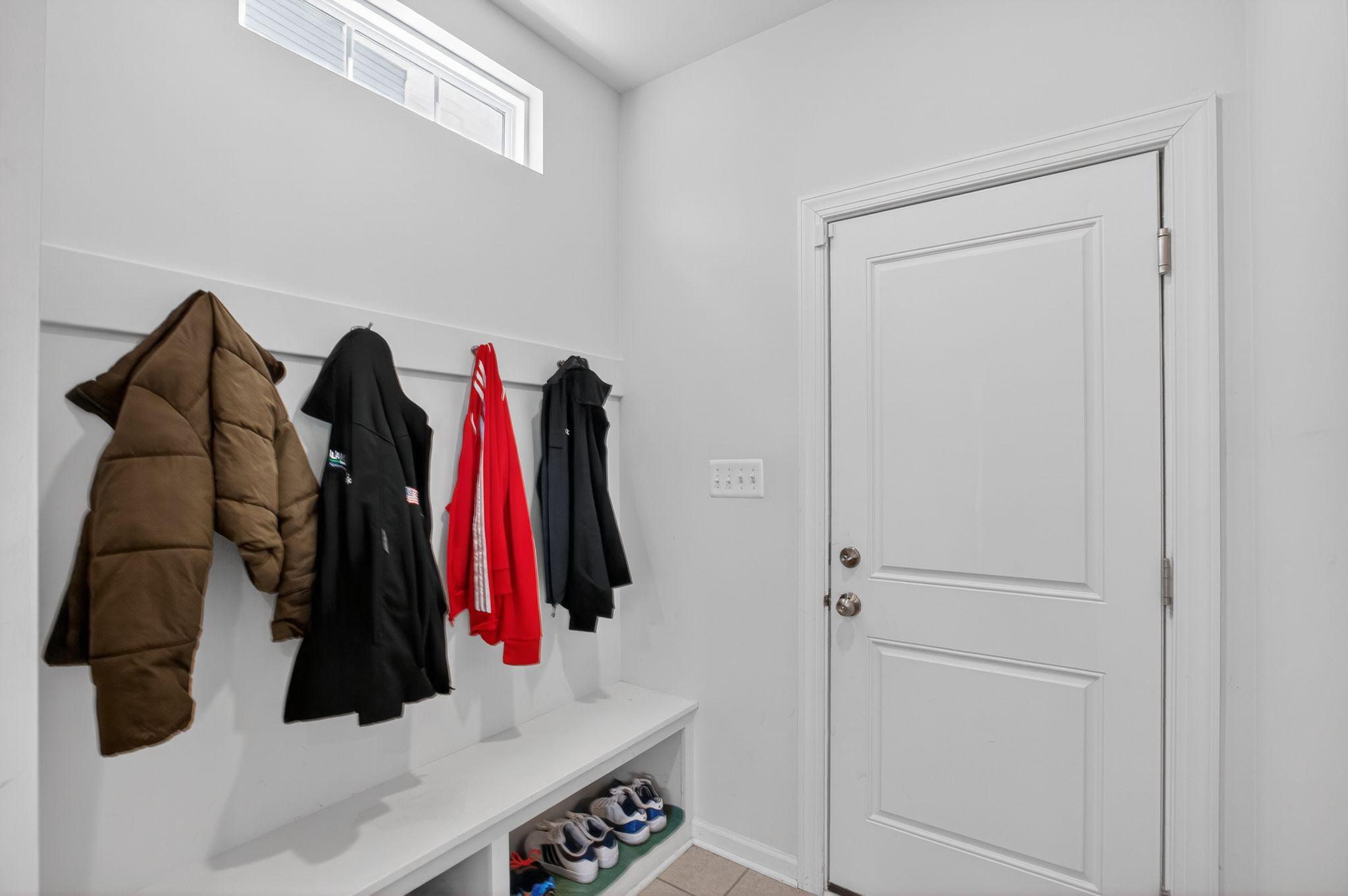 5500 Big Huntingdon Lane Brandywine, MD 20613 - Photo 10 of 31 Built-in cubbies and coat hooks in mud room
