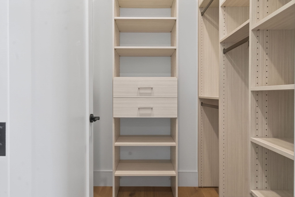 1114 Beacon Street, Unit 101 Newton, MA 02461 - Photo 19 of 29 a view of an empty walk in closet