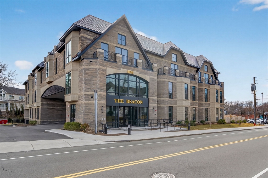 1114 Beacon Street, Unit 101 Newton, MA 02461 - Photo 26 of 29 a view of a big building in front of a building