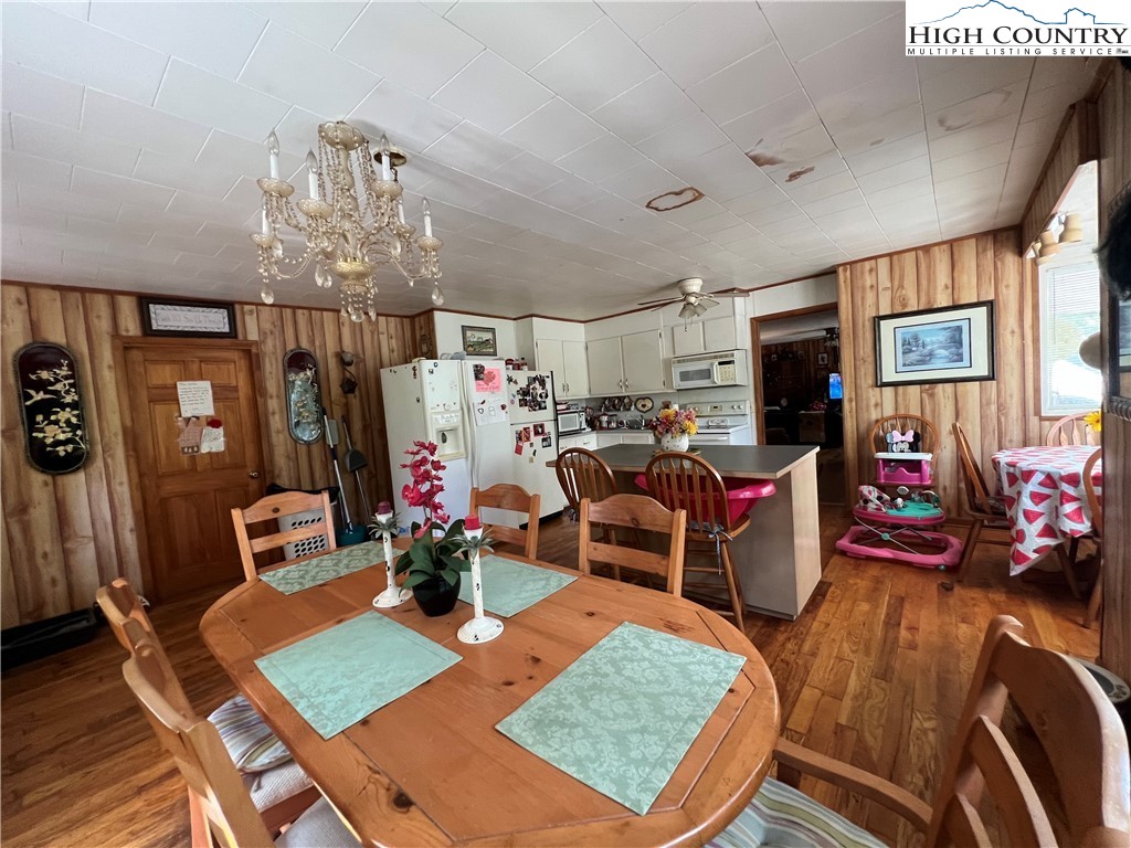 455 Willowdale Church Road Vilas, NC 28692 - Photo 4 of 14 a view of a dining room with furniture