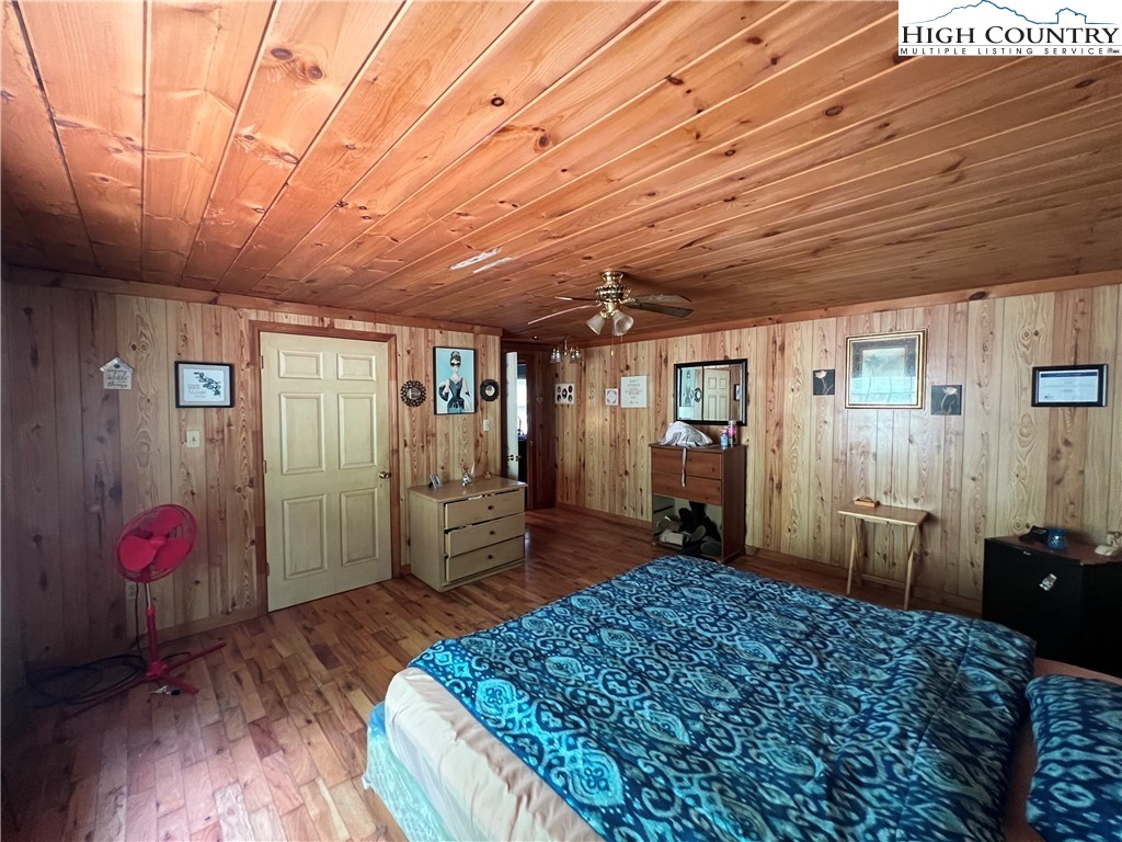 455 Willowdale Church Road Vilas, NC 28692 - Photo 9 of 14 a bed room with a bed