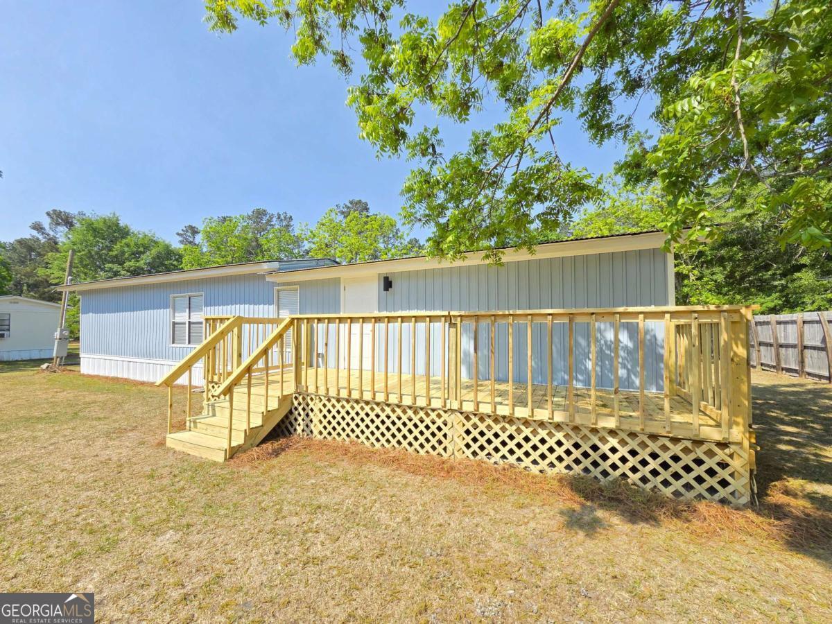 956 Donaldson Street Metter, GA 30439 - Photo 30 of 49 a view of a wooden fence