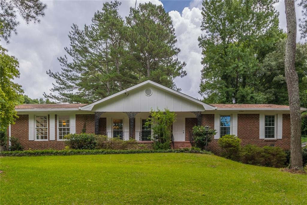 628 Cheviot Drive Decatur, GA 30032 - Photo 1 of 1 a front view of a house with a garden
