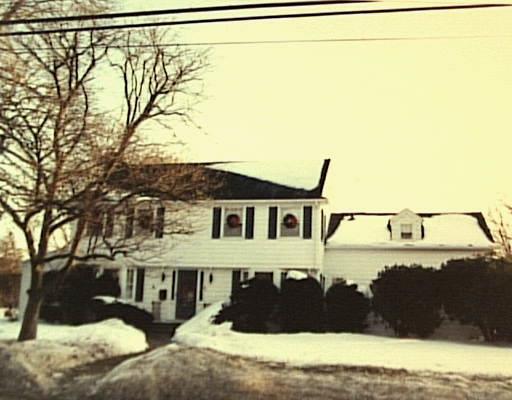 186 Cutspring Road Stratford, CT 06614 - Photo 1 of 1 a front view of a house with a yard
