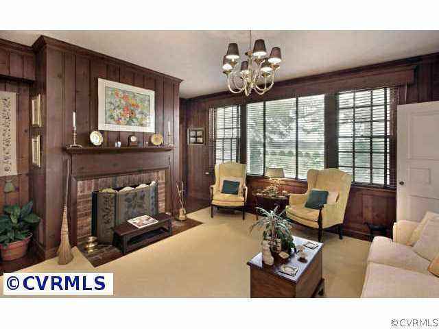 1322 Shallow Well Road Manakin-Sabot, VA 23103 - Photo 5 of 10 a living room with furniture and a fireplace
