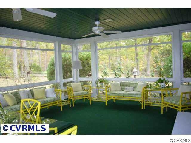 1322 Shallow Well Road Manakin-Sabot, VA 23103 - Photo 8 of 10 a living room with furniture and a large window