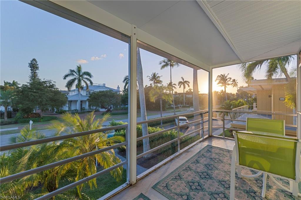 291A 8th Avenue South, Unit 291B Naples, FL 34102 - Photo 3 of 10 Sunroom featuring plenty of natural light