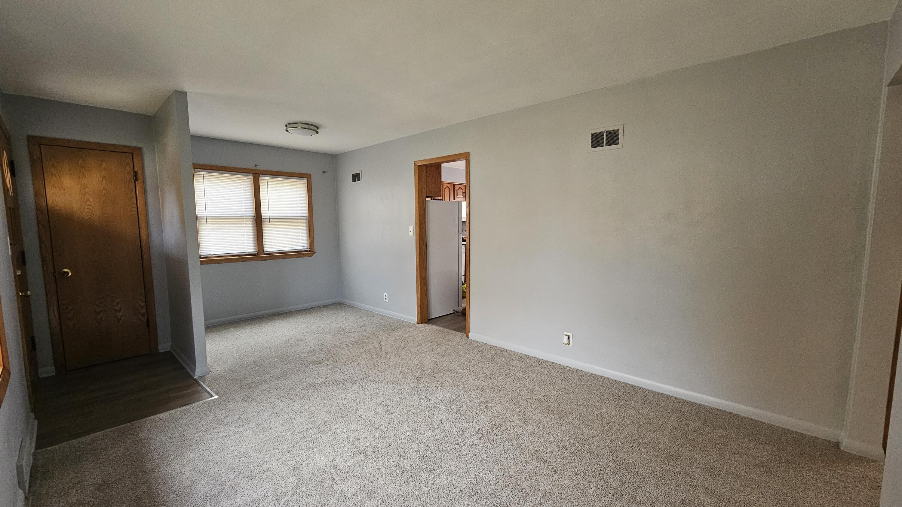 3445 North 96th Street Milwaukee, WI 53222 - Photo 4 of 19 Living/Dining Room 2