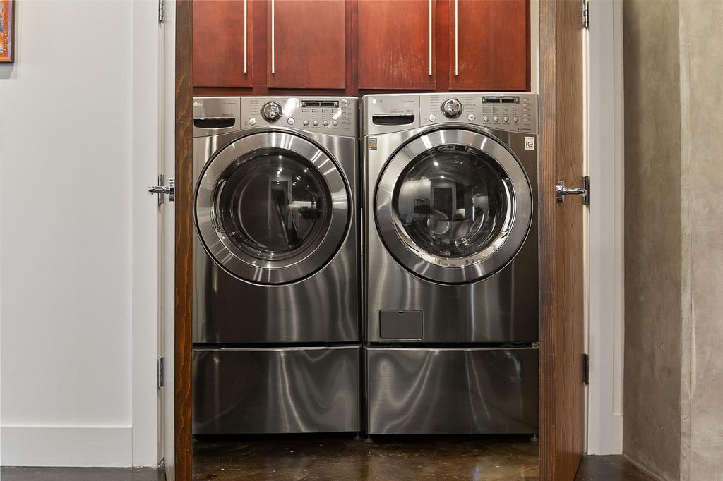 3030 Bryan Street, Unit 409 Dallas, TX 75204 - Photo 12 of 30 a utility room with dryer and washer