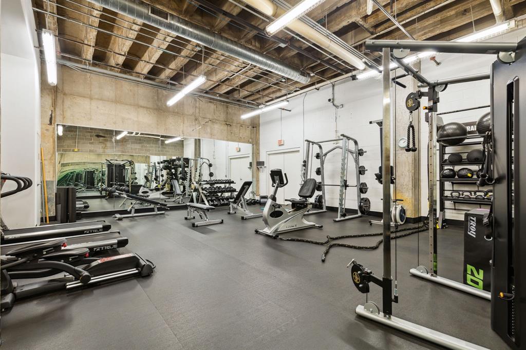 3030 Bryan Street, Unit 409 Dallas, TX 75204 - Photo 24 of 30 a view of a room with gym equipment